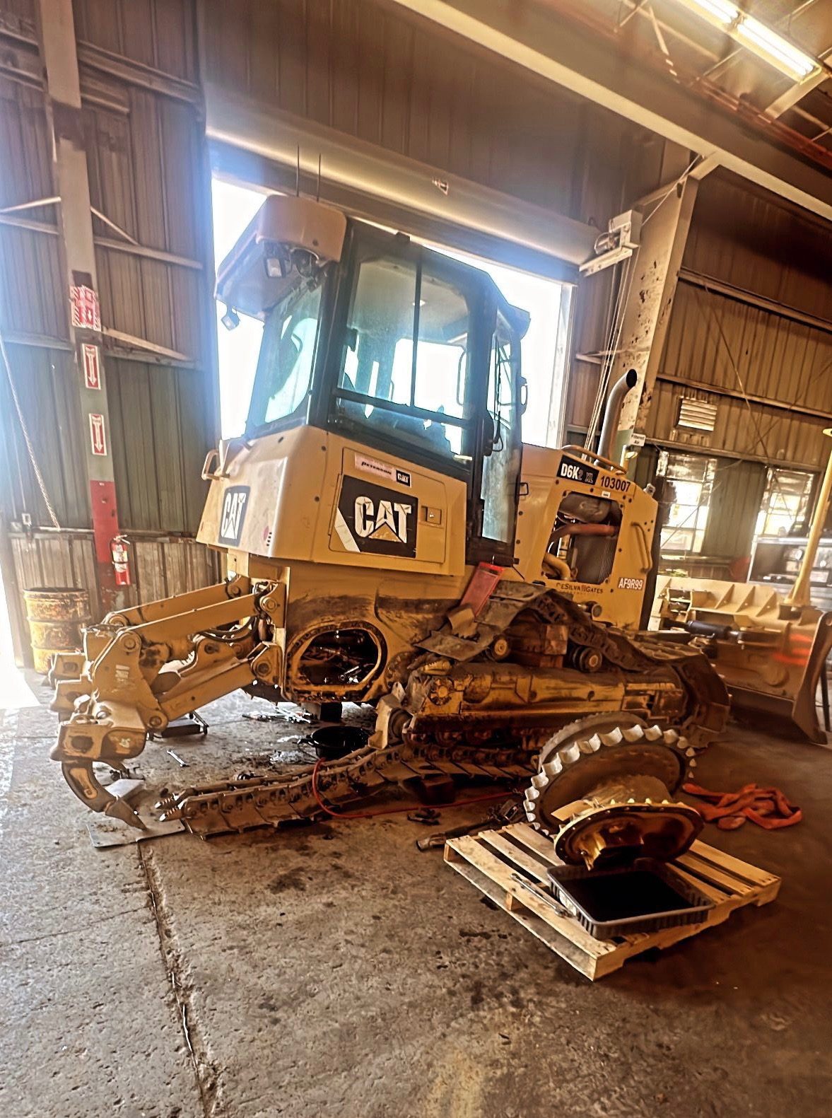 Heavy equipment powertrain and final drive component work